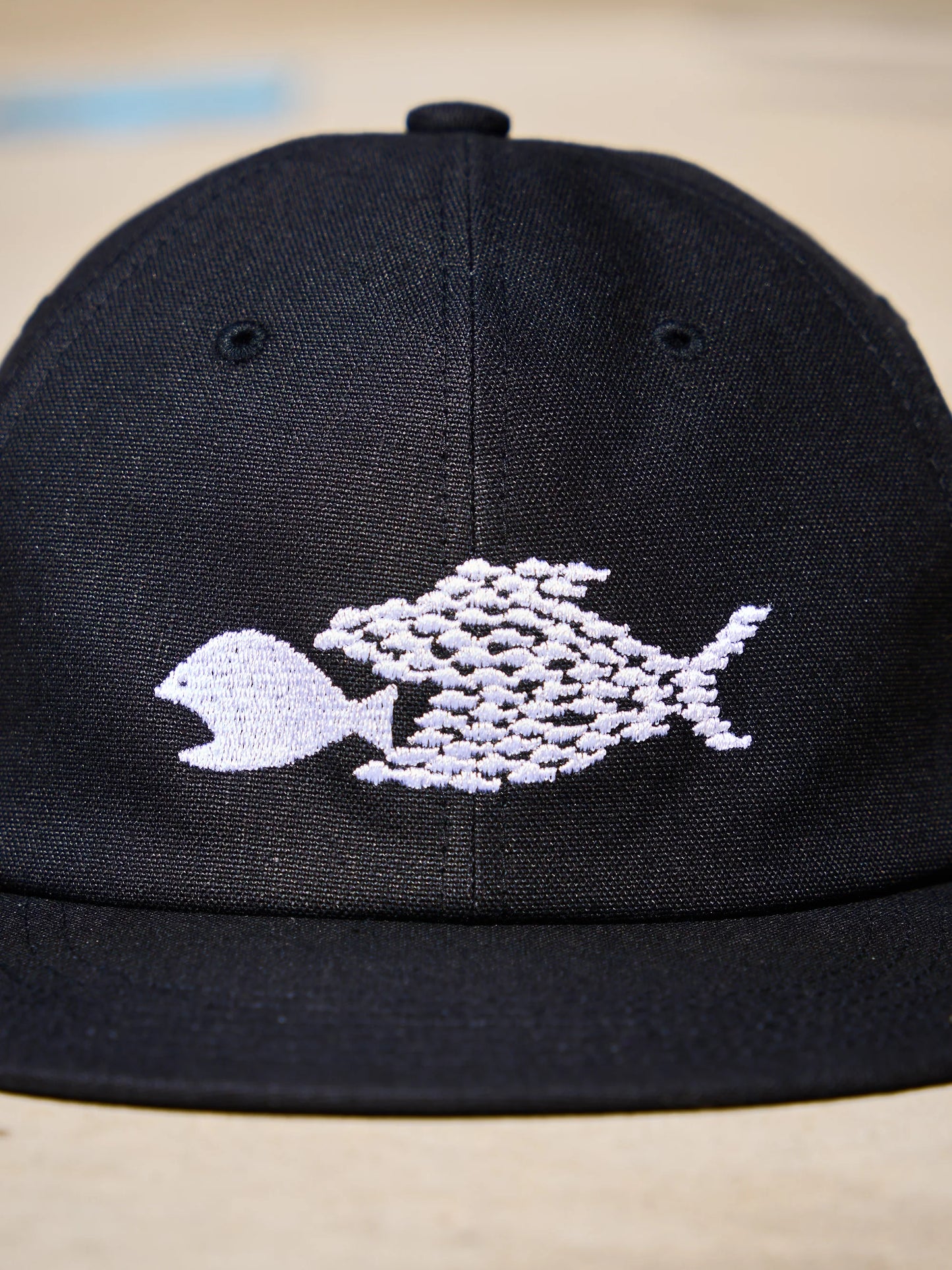 HARD BRIM 6 PANEL CAP LOW (SOLIDARITY) BLACK (WHITE EMB)